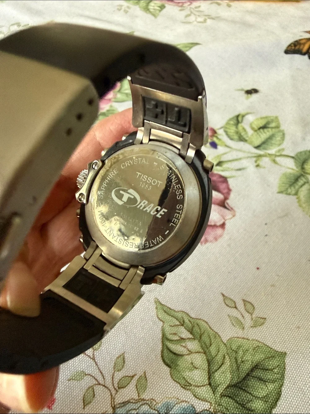 Tissot Black Dial Chronograph Watch with Silver Case and Orange Accents